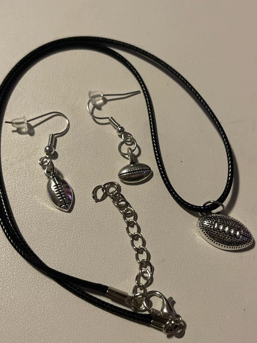Silver Football Pendant Necklace and Earring Set in Black